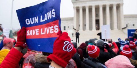 Supporters of gun control and firearm safety measures hold a protest rally outside the Supreme Court in 2019.