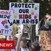 Tens of thousands march for gun control in US after Texas school shooting - BBC News