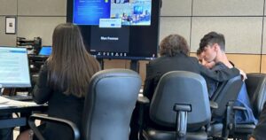 Man accused of mass shooting threats to remain jailed